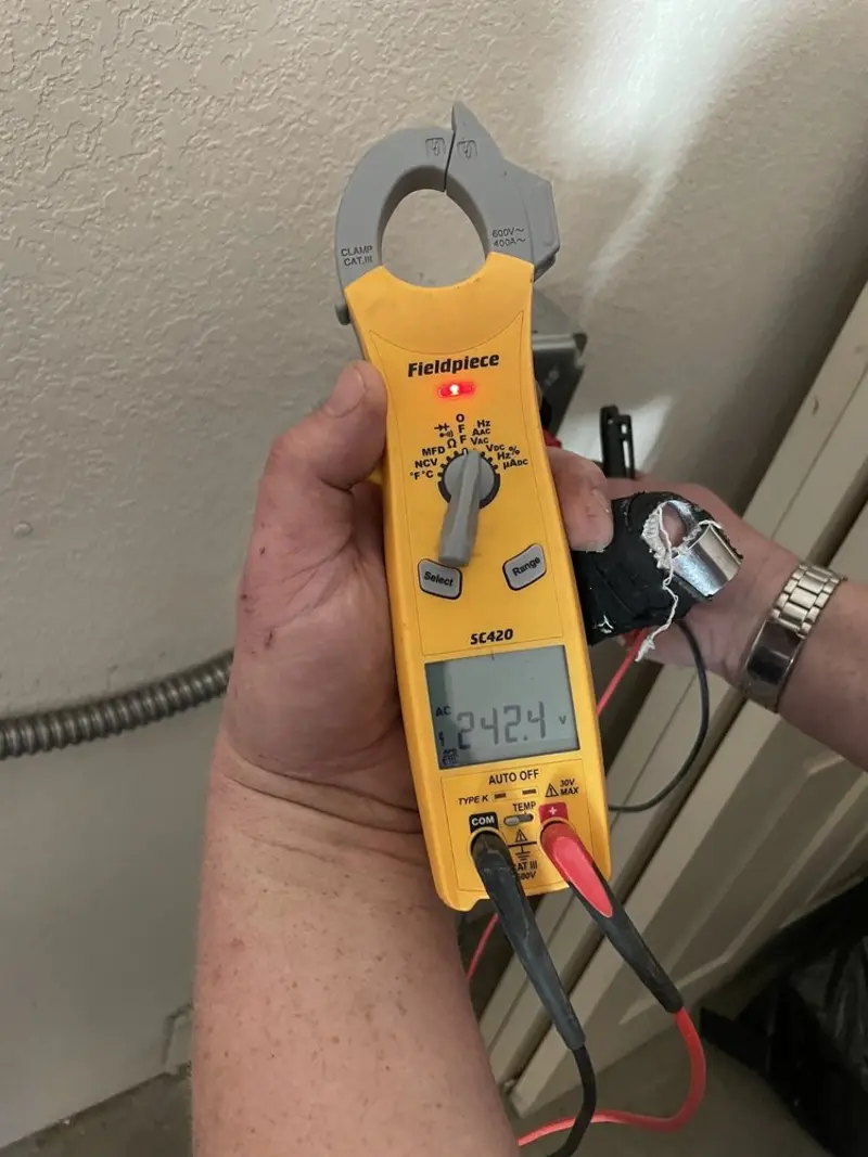 Voltage testing with clamp meter during Hot Tub / Pool Electrical Wiring in Wrentham
